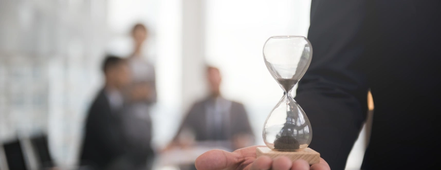 businessman-holding-hour-glass-signifies-importance-being-time
