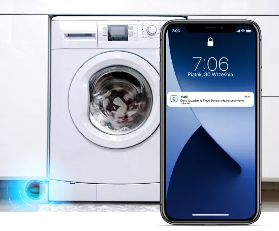 Telefon komórkowy na tle pralki Telefon komórkowy na tle pralki