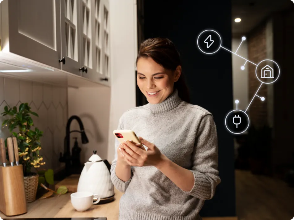 Kobieta korzysta z Enea Smart na telefonie Kobieta korzysta z Enea Smart na telefonie
